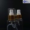 Botol Pump 100 ml RF Bening-tutup Putih list Gold (2)